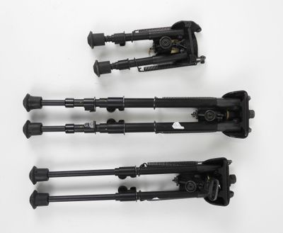 three different types of guns are shown on a white surface