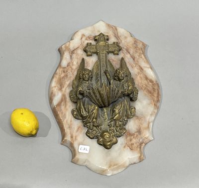 a picture of a wall plaque with a lemon next to it