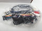 a bunch of cables and wires wrapped in plastic on a table
