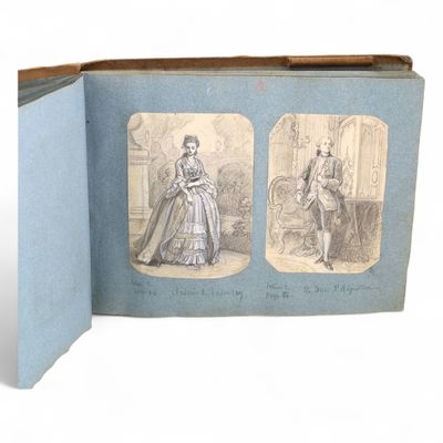 un vieux livre sur lequel figurent deux images représentant une femme et un homme
