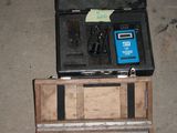 a box with tools in it sitting on the floor