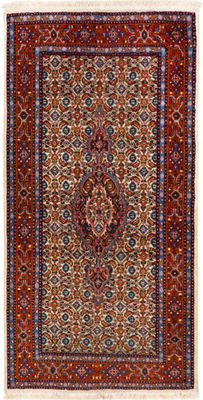 a red and blue rug with a medallion design on it