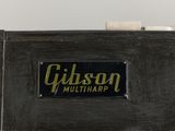 a close up of a black suitcase with a sign on it