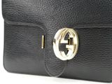 guccissi black leather clutch bag with gold hardware