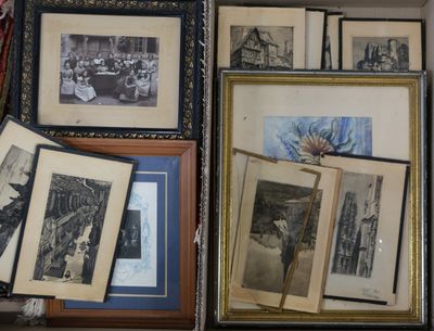 a lot of old photos on a shelf in a room