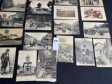 several old black and white photographs of people and buildings