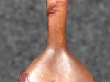 a brown vase with a floral design on it