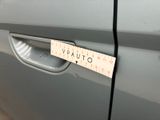 the car door handle is marked with a ruler to measure the width of the door handle