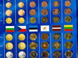 an image of a blue book with a bunch of different coins on it