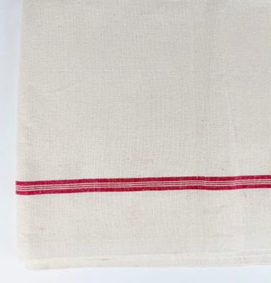 a close up of a white towel with red stripes on it