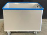an image of a metal container with a blue lid