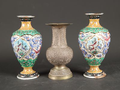 three vases are sitting on a table with a black background