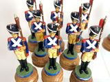 a lot of figurines of soldiers on display