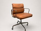 an image of an office chair with a brown leather upholstered seat