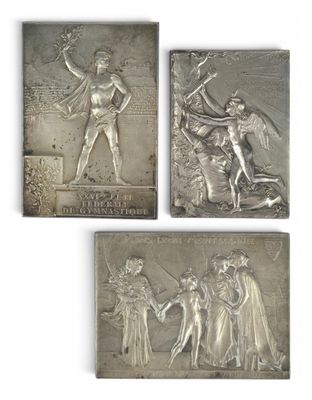 four silver metal plaques depicting a woman and a man with a sword