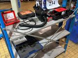a picture of a work bench with tools on it
