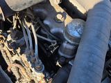 a close up of the engine of a blue car