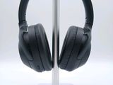 a pair of headphones that are on a stand