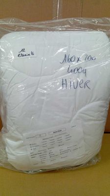 a bag of toilet paper that is wrapped in plastic