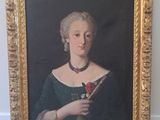 tableau représentant une femme tenant une rose à la main