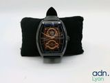 an image of a wrist watch with a black band and a black case