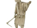 statue of a man with a sword and a hat on a white background