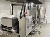 an image of a commercial kitchen with stainless steel appliances