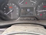 a close up of a car dashboard with a speedometer and gauges