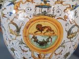 two vases that have been decorated with animals on them