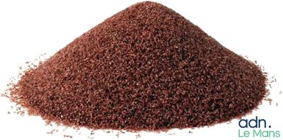 a close up of a pile of dirt on a white background