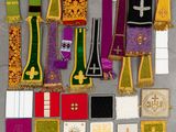 several different types of cloths are laid out on a table