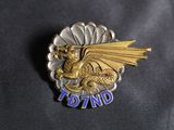 a close up of a badge with a dragon on it
