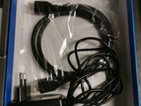 a box that has a charger and a cable in it