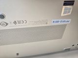 a close up of a laptop with a sticker on it