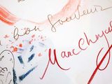 a white board with writing on it with a picture of a heart
