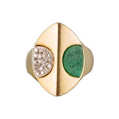an image of a close up of a gold ring with a green stone