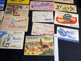 many different types of advertising cards on a table