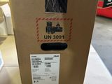 a cardboard box with a sticker on it sitting on a table