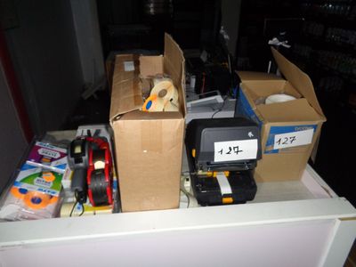 many boxes of items on the counter in the room