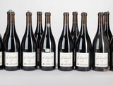 six bouteilles de vin alignées les unes à côté des autres