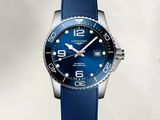 a close up of a watch with a blue strap on a white background