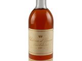 une image représentant une bouteille de whisky sur fond blanc