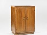 a wooden cabinet with two doors and a door handle
