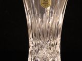 a glass vase that is sitting on a table