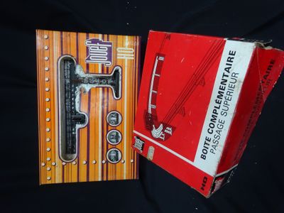 a red box with a black and white picture on it