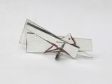 two pieces of metal that have been cut in half
