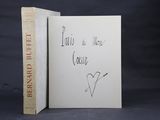 un livre sur lequel est dessiné un cœur et un livre sur lequel est dessiné un cœur