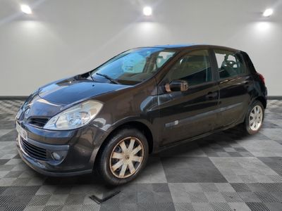 a picture of a small car parked in a garage