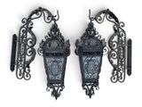 pair of antique cast iron wall sconces with glass panels
