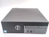 a dell desktop computer on display on a white surface